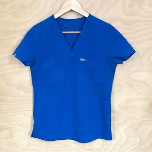 Figs Women's V-Neck Scrub Top in Royal Blue Size XS.(Flaws).